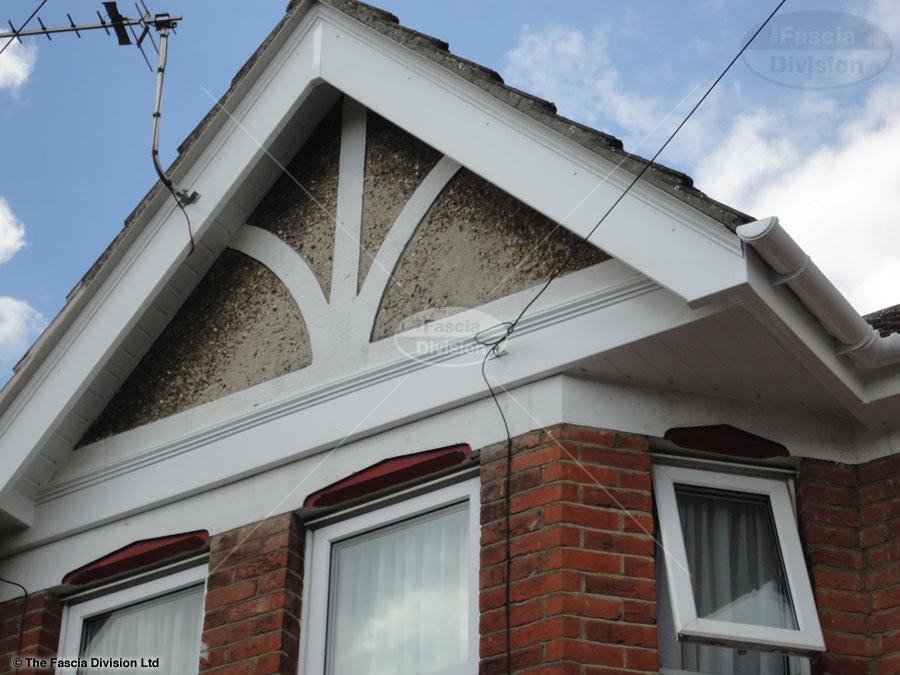 White fascia, white tongue and groove soffit with white half round