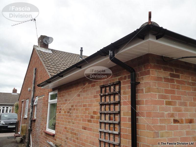 UPVC tongue and groove soffit UPVC black half round gutters Portsmouth