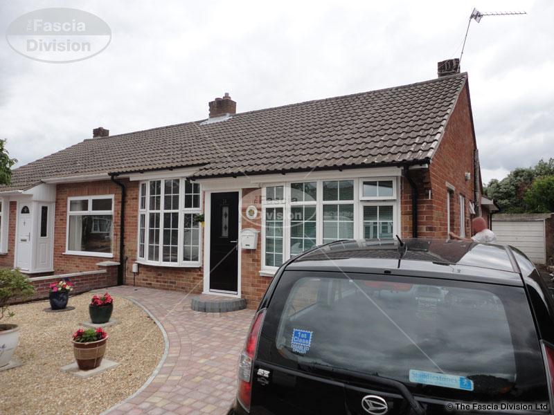 UPVC tongue and groove soffit UPVC black half round gutters Portsmouth