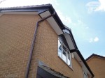 rosewood fascias with white tongue and groove soffit and brown half round guttering installation southampton