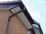 white tongue and groove soffit with rosewood fascias and brown half round gutter southampton