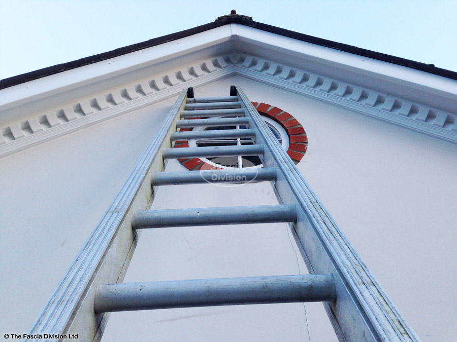 Installation of dentil mouldings on the gable end