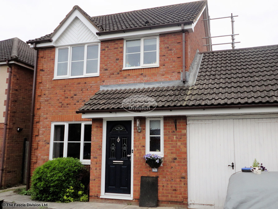 Installation of UPVC white fascia, white UPVC soffit with brown square guttering in Eversley