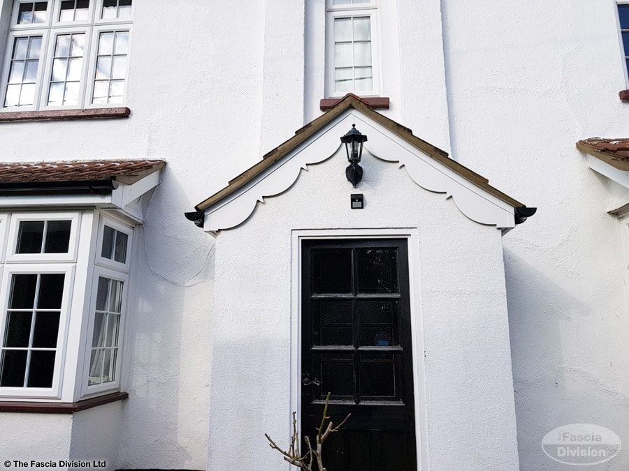 Decorative bargeboards on a porch gable after installation