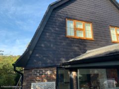 Black Hardieplank weatherboard cladding