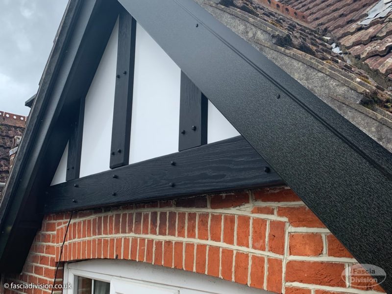 Black mock Tudor with black fascia boards