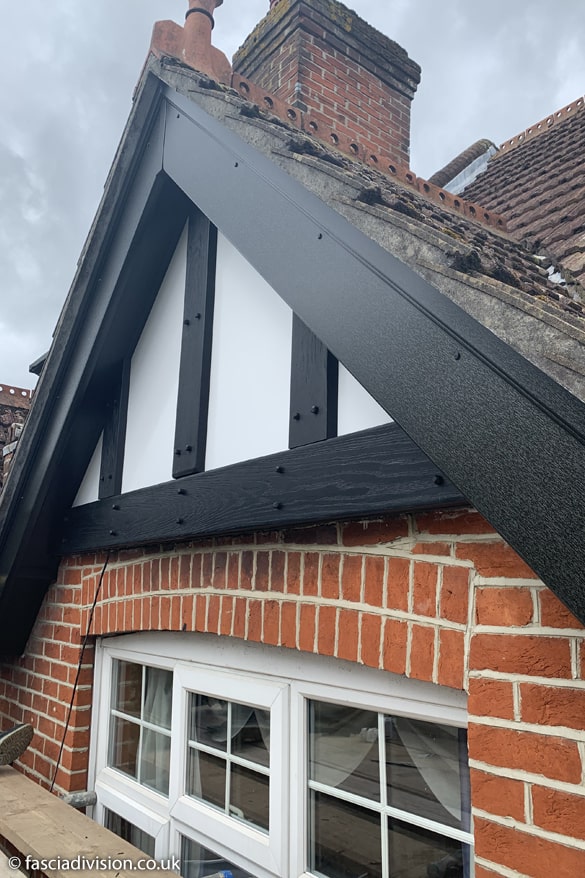 Mock Tudor replacement with black fascias and soffits