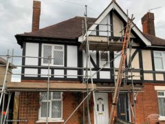 Semi-detached house with new Mock Tudor and render boards
