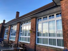 Anthracite fascia, white soffits with seamless guttering