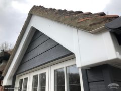 Composite cladding installation on a dormer window