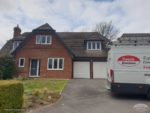 Grey fascia and guttering with white soffits