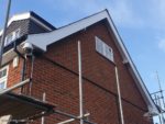 White UPVC bargeboard and soffits on a gable end