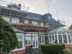 Scaffolding over two conservatories