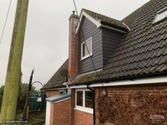 Black cladding on a dormer window