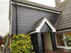 Black Hardieplank cladding and new fascias and soffits