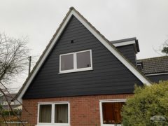 Black Hardieplank cladding on a gable