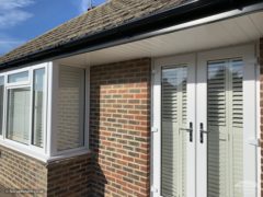 Black fascias and guttering with white soffit