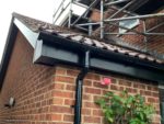 Black fascia, soffit and guttering on lower level