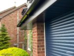 Black UPVC fascias and soffits on a garage