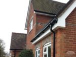 new white fascias and soffits with black guttering