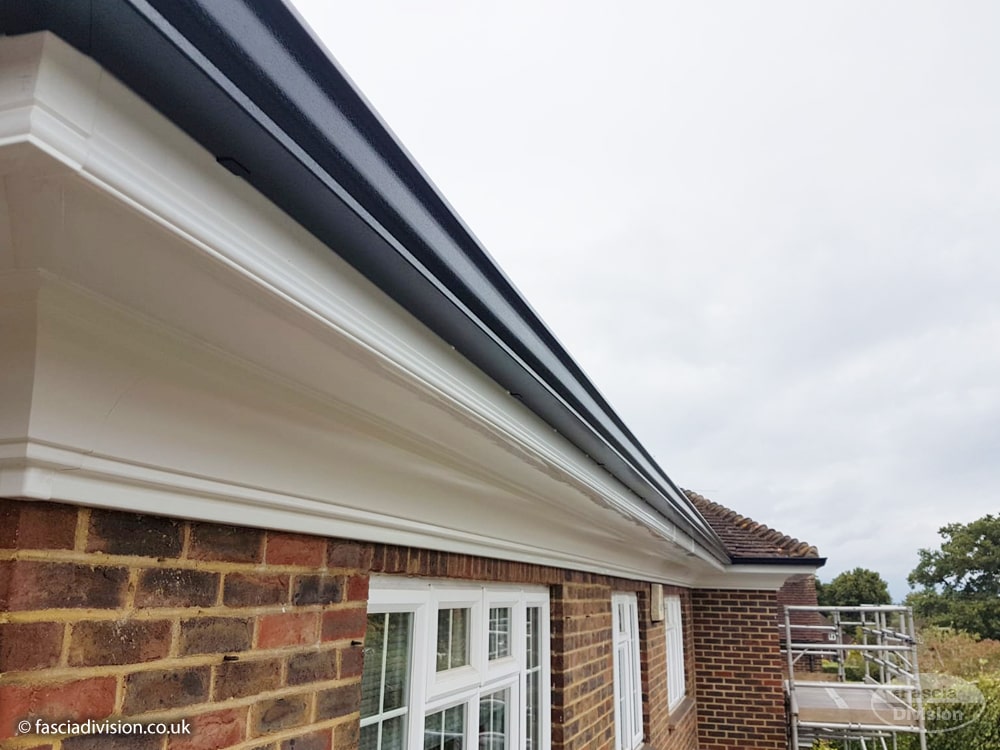 Ogee UPVC fascia boards with seamless guttering Guildford Ogee UPVC fascia boards with seamless guttering