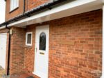 white UPVC flat soffits fascias with black guttering