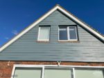 Hardie plank cladding installation on gable end
