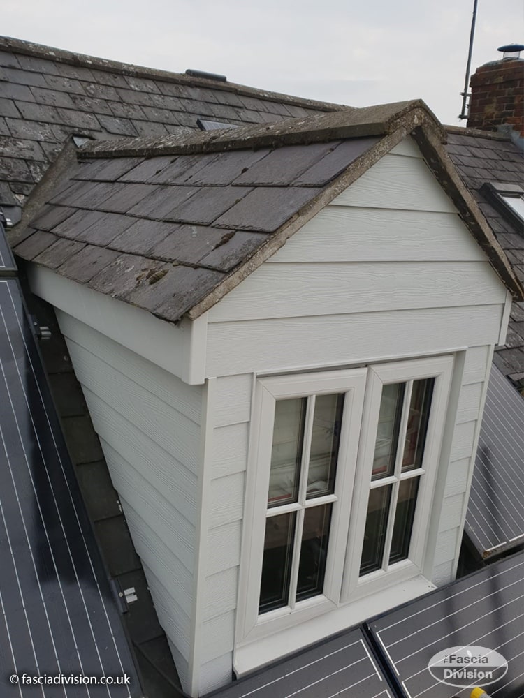 Hardie Plank cladding with colour matched fascia boards on a dormer winow