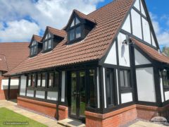 Black mock Tudor boards and white composite render board