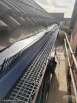 Installation showing bird guard, eaves tray and gutter guard