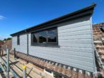 New anthracite windows with new Fortex composite cladding on a large dormer window