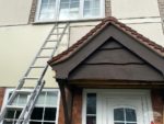 Before removal old wood fascia and cladding on a porch