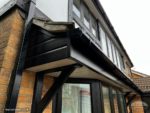 Black fascia, white soffit with black guttering
