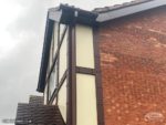 Replica wood mock Tudor with cream render board and UPVC rosewood fascias and soffits