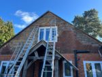 Tile hung exterior being removed ready for cladding