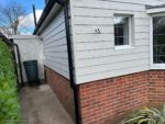 Cobblestone Hardie Plank cladding on corner of house