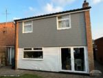 Slate grey Hardie Plank with new fascia, soffits and guttering