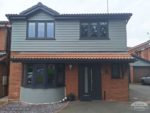 New slate grey cladding, windows, fascia, soffit and guttering