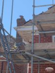 Before installation decorative fascias showing scaffolding