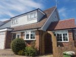 White fascias, soffits and black gutters