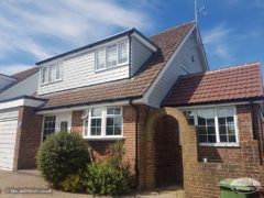 White fascias, soffits and black gutters