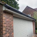 Garage with agate grey fascias and soffits with anthracite square guttering