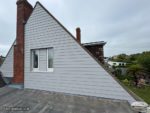 Pearl grey hardie plank cladding in Hayling land