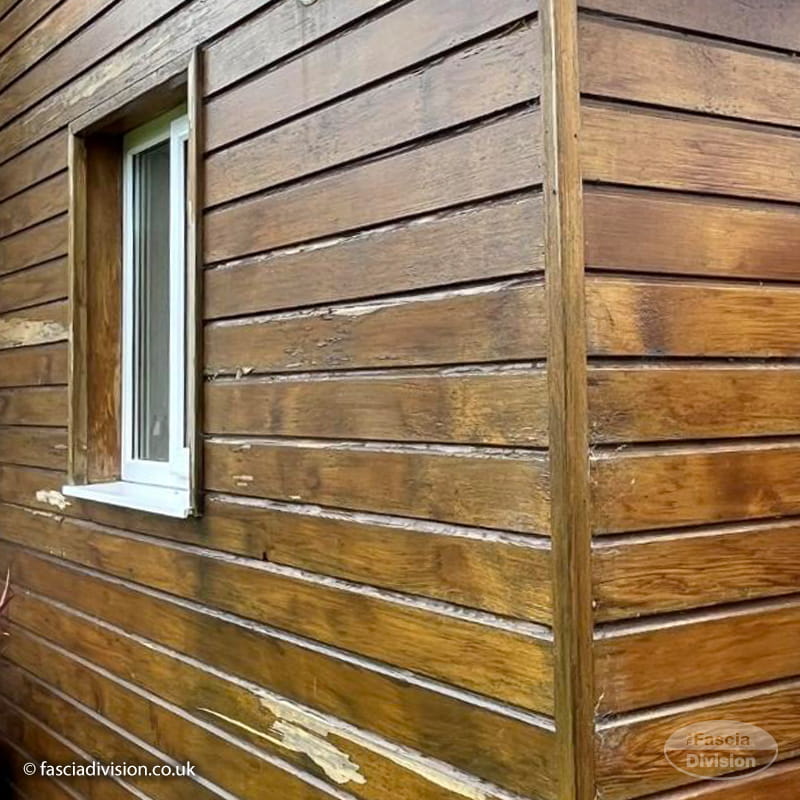 Corner view of a extension in Portishead showing traditional wooden weatherboarding prior to an upgrade.